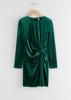Smickrande green miniklänning med knappar.